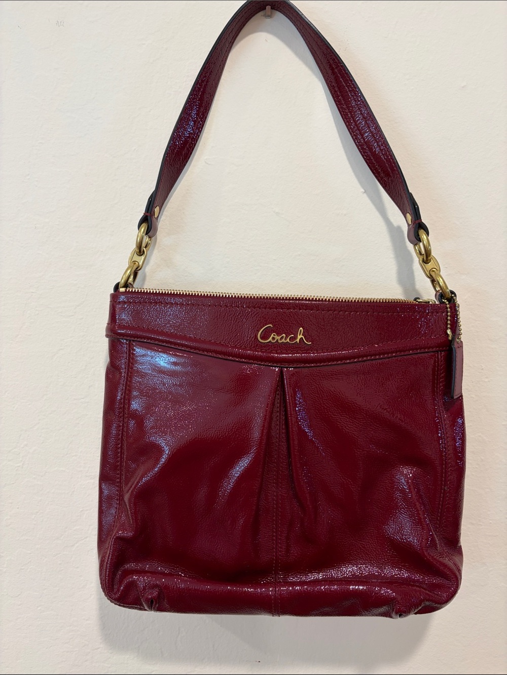 Coach Cherry Red Leather Shoulder Bag with Gold Accents with matching wallet.